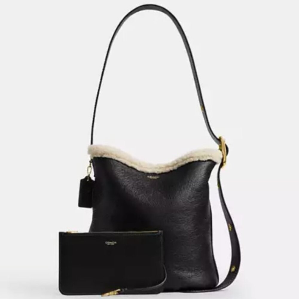 Coach shearling Bleeker black bucket bag.  CCC28 PRICE IS FIRM 😊